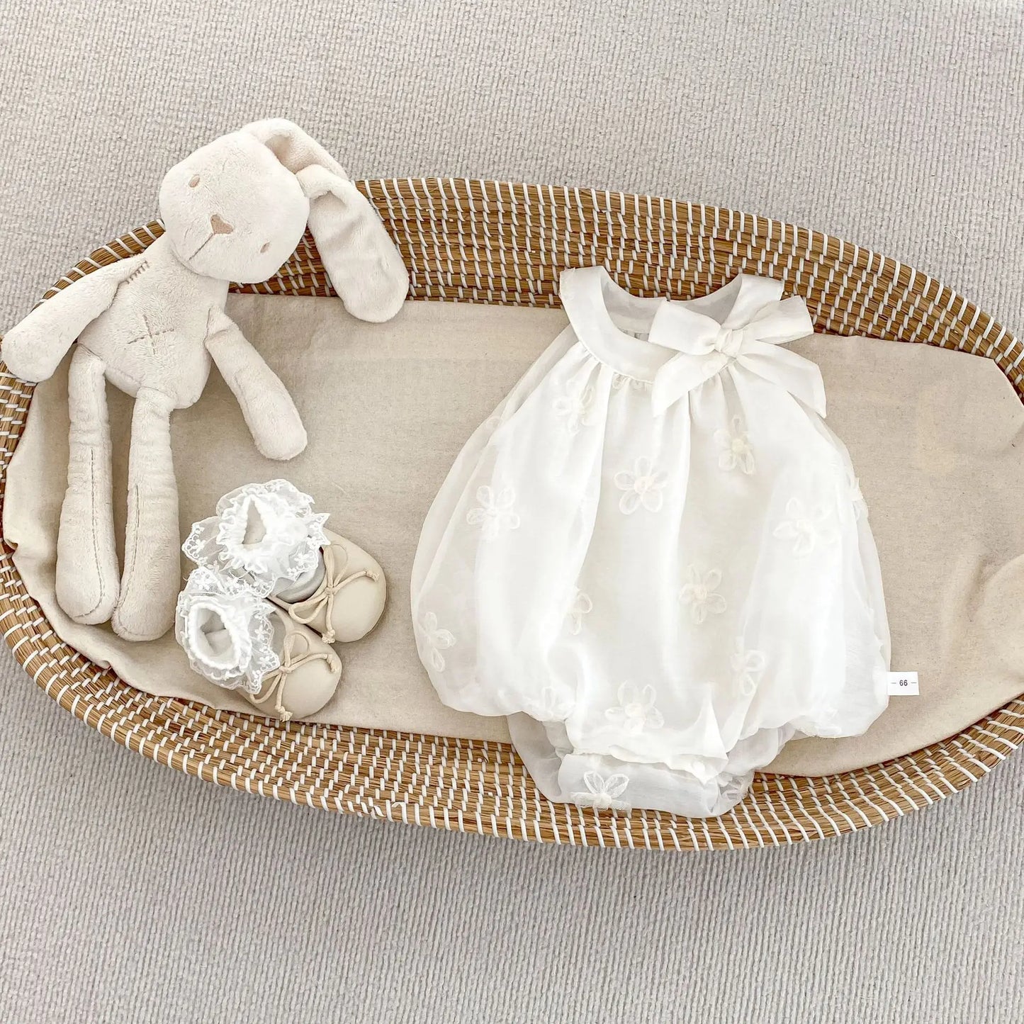 Barbotteuse habillée bébé fille - nœud papillon et élégance