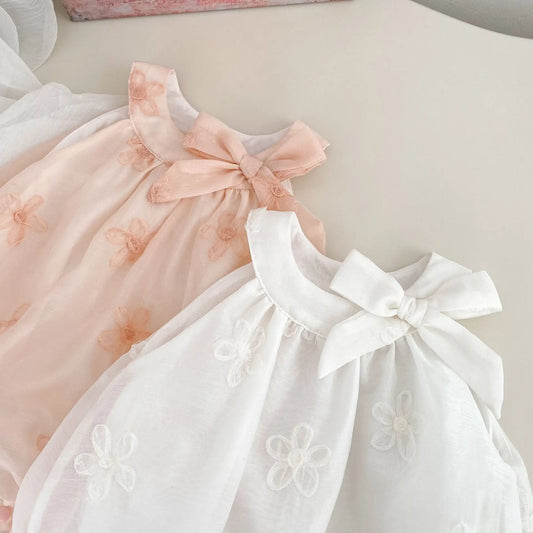 Barbotteuse habillée bébé fille - nœud papillon et élégance